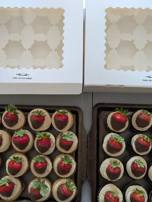 Mini chocolate strawberry cupcakes prepared for bulk packaging
