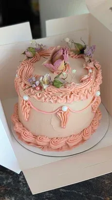 Bride and Groom Cutting Cake